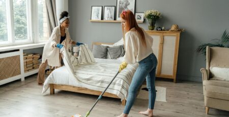 Green Angel Cleaning Services professional using eco-friendly products in a St. Louis home