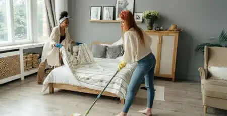 Green Angel Cleaning Services professional using eco-friendly products in a St. Louis home